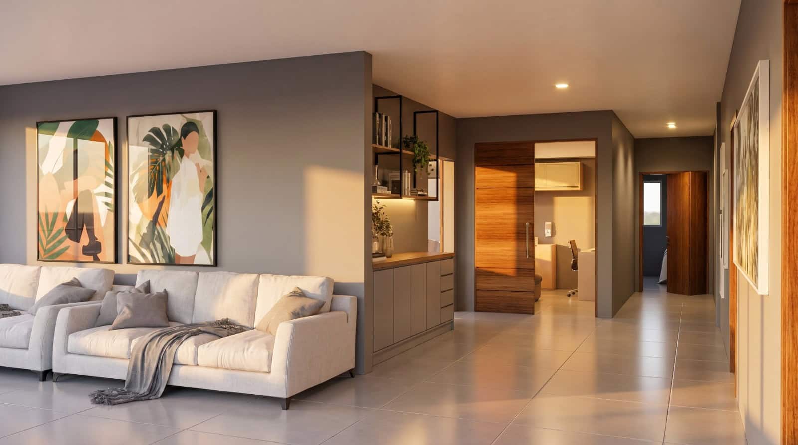 Sala de leitura com sofá branco e arte tropical
