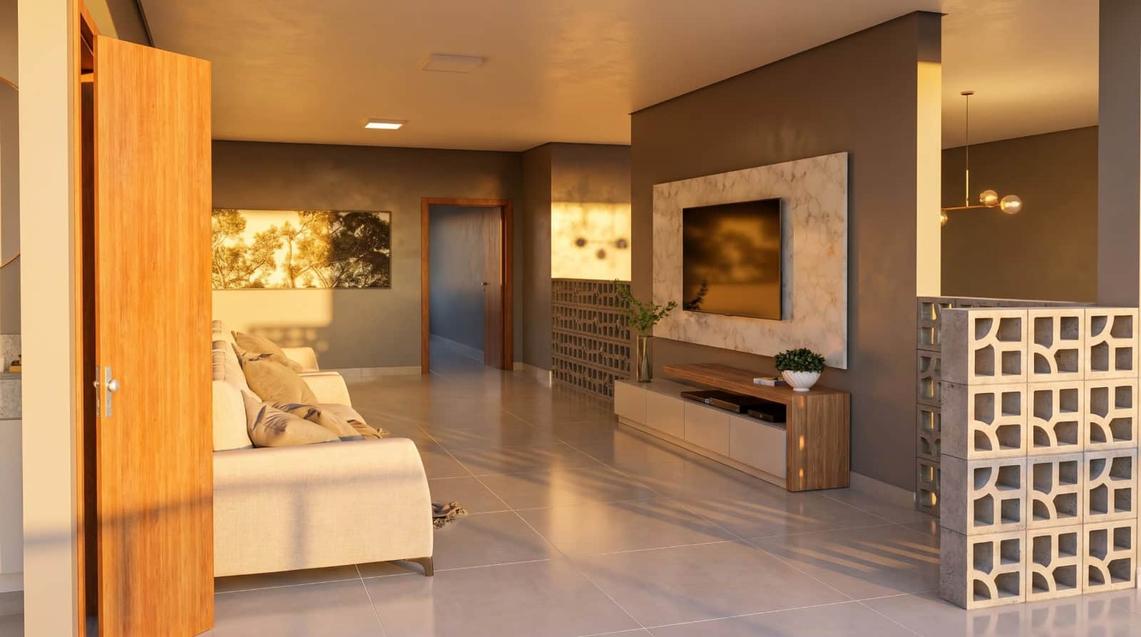 Sala de TV com painel de mármore e sofá creme